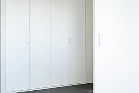 ヒュートのマンションリフォーム施工事例リビング造作扉
